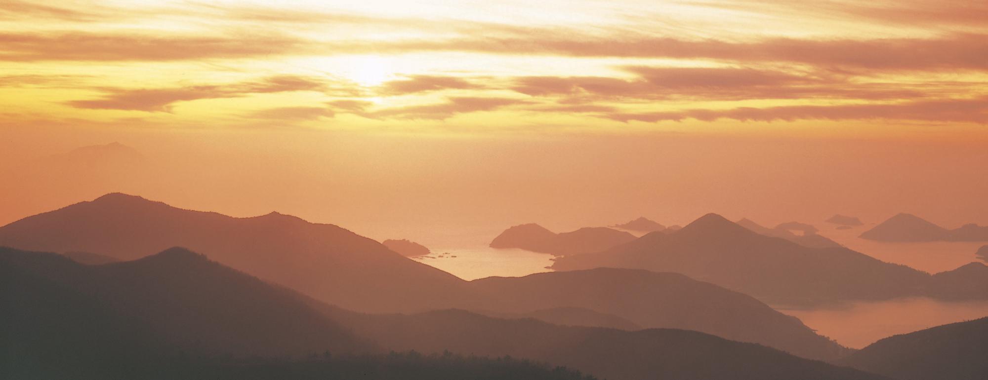 image of mountains in a hazy sunset